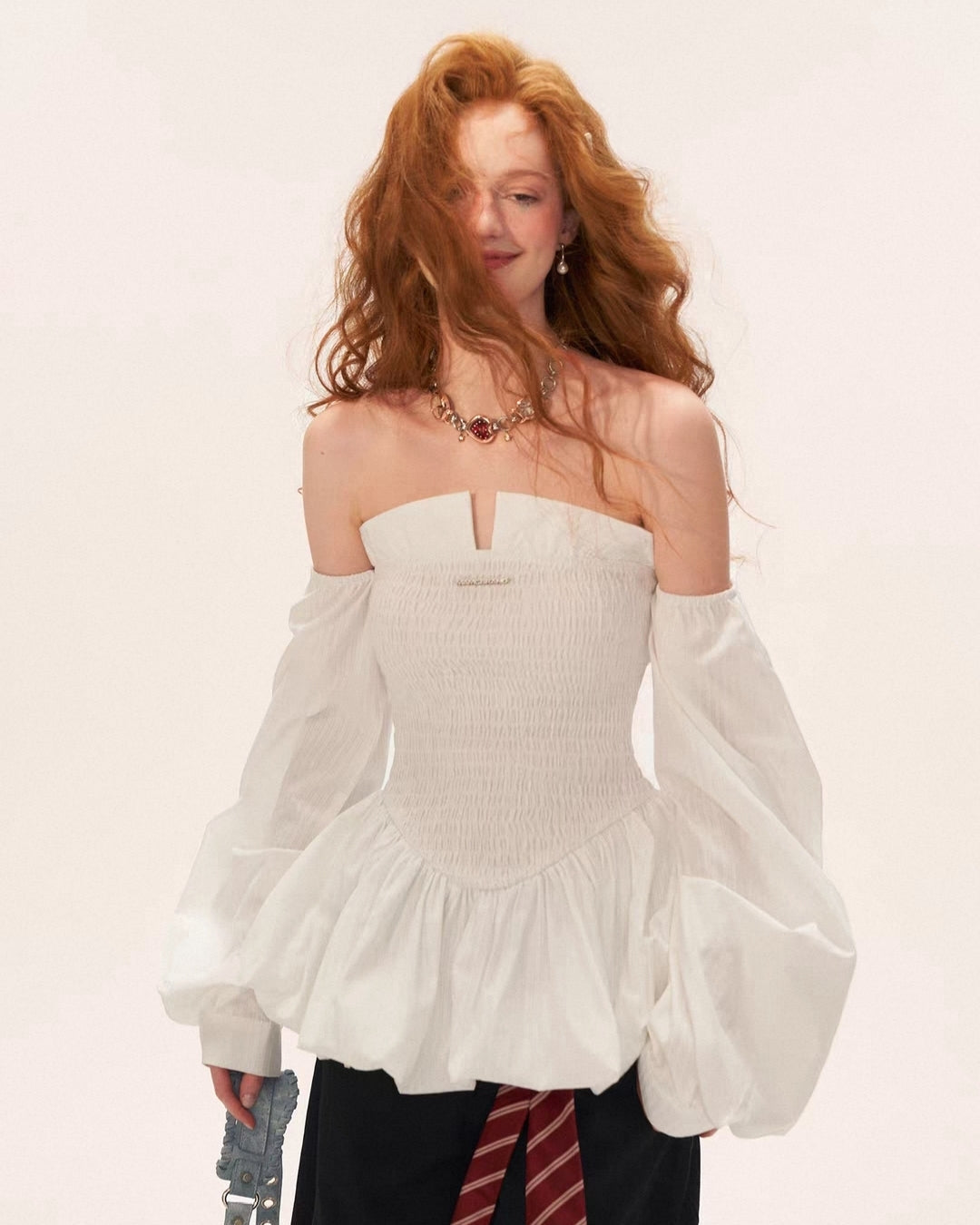 Elara Off-Shoulder Smocked Peplum Top